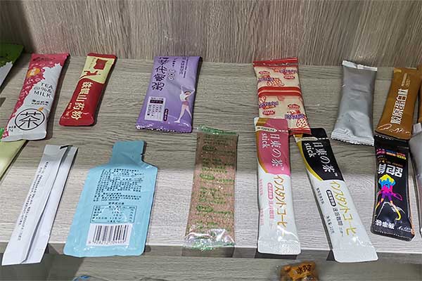 奶茶粉末包装机可采用三边封、四边封、圆角袋型